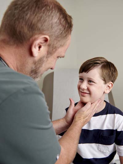 Medical Doctor Examining Patient